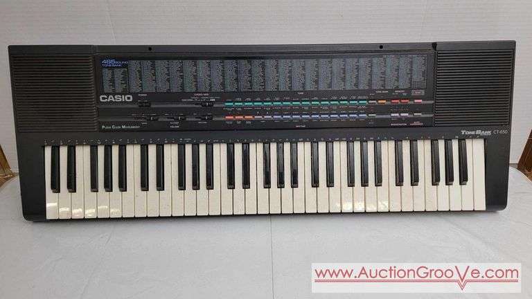 CASIO 465 Sound Tone Bank Electronic Keyboard. Plugged it in, tested many of the features and it seems to function properly. I wiped off the last 4 keys with a damp rag and they cleaned up nicely. Inc