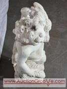 Four Seasons Cherub Garden Statue. 7 x 24. Two others in lots #47 and 292. FR7F