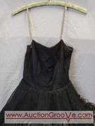 Vintage Ostrich Feather Dress with Photo of it in Action. Seems to be intact. Appears to be a size Small/Medium. CB