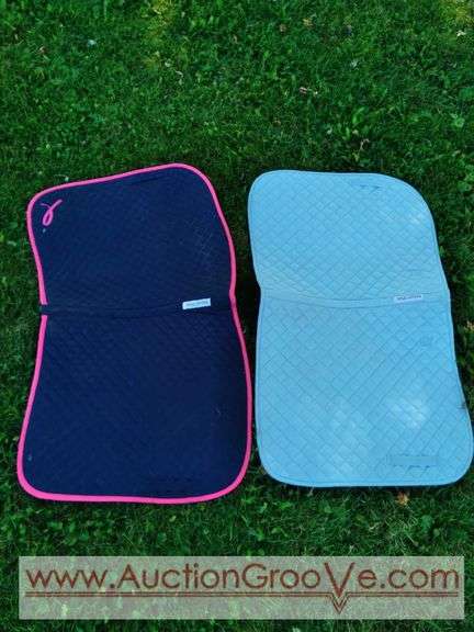 Two gently used SmartPak pads, 23x44. Sky blue and black with pink trim pads in great condition.