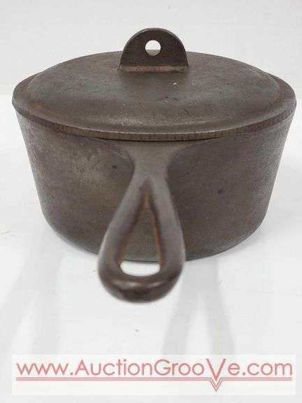Cast Iron Pot with Lid. 2 QT Pan Surface is 6.5 x 3. A2