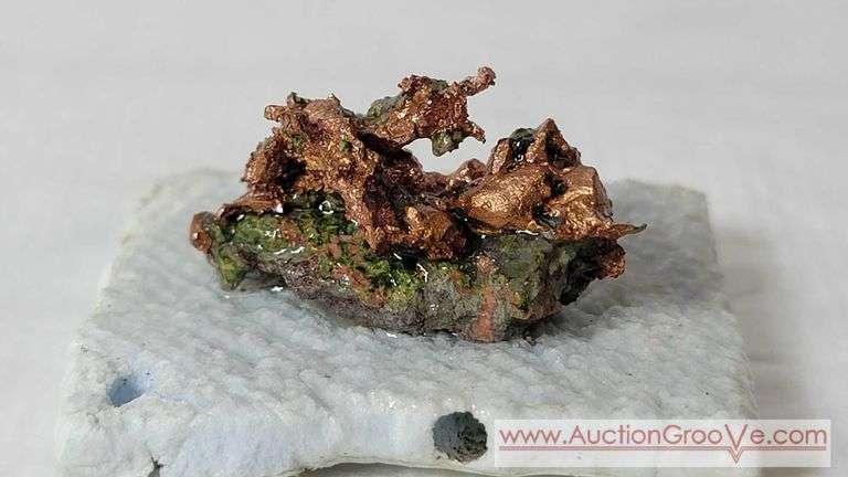 Native Copper Specimen on Styrofoam. 6 grams gross. 1 1/8" x 1/2" x 5/8" high. B1