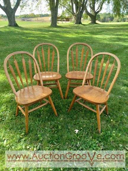Four wood dining chairs by Rivers Craft, in great condition. Sturdy wood chairs 37Hx17Dx19W. Have been in inside storage so need light cleaning.