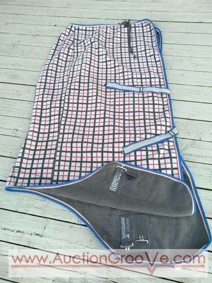 Rambo Deluxe Fleece horse cooler by Horseware Ireland. Very gently used and really clean! Grey and pink with blue trim, size 72in.
