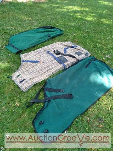 Two Stateline Tack 74in green coolers and a 5/A Baker 74in plaid stable sheet. All are clean and in good used condition