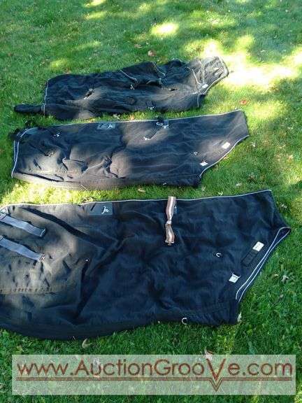 Schneider adjustable fit blankets, all are cleaned. Two are stable blankets (size 82/84) and one turnout blanket (size 84). Some have had repairs, but all in good used condition. See photos