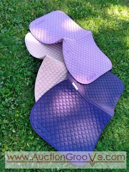 SmartPak saddle pads in cream and purple colors. Very gently used pads.
