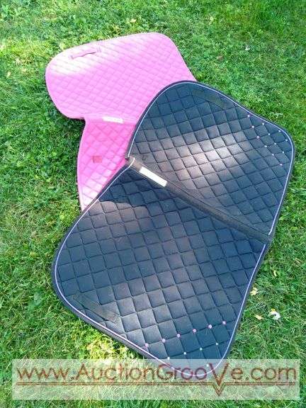 Two SmartPak pads. Gently used pads in pink and black with purple trim and bling! Pads are 23x44