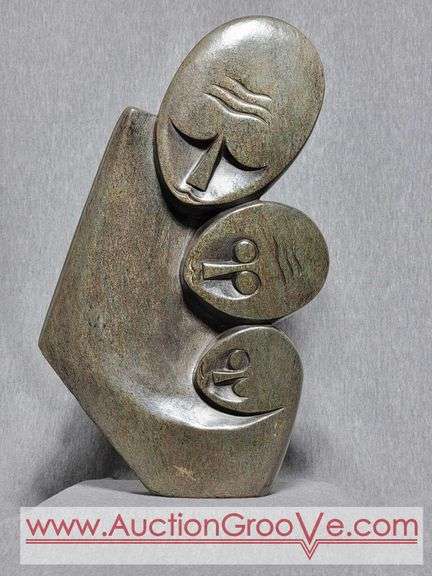 Shona Family of 3 Sculpture. 13.5 x 8.5 x 2. B3
