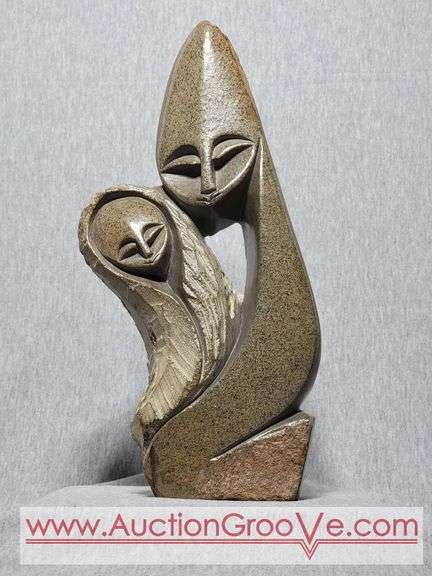 Shona Man and Woman Statue. Signed by Artist Innocent Chifutu. 6 x 3 x 12.5. B3