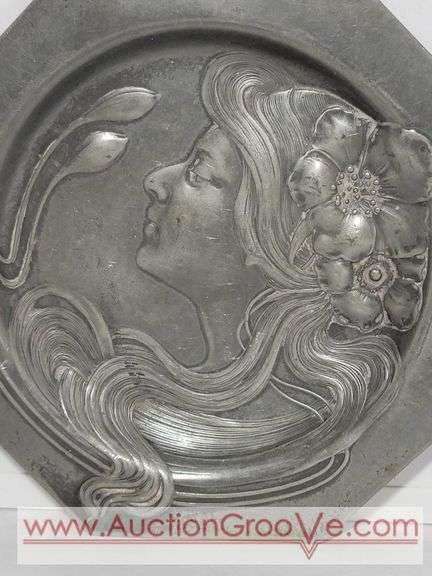 An Art Nouveau high relief portrait plate
