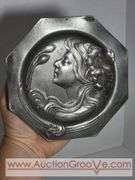 An Art Nouveau high relief portrait plate