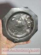 An Art Nouveau high relief portrait plate