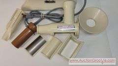 Champion Juicer. In original box and appears complete as shown in photos. Runs smoothly and shows no wear. Probably not used much, if at all. Sells to the highest bid over $180.