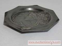 An Art Nouveau high relief portrait plate