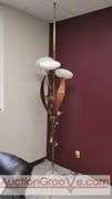 Awesome Tension Pole Floor Lamp with 3 - UFO Glass Shades and what appears to be original artificial flora. Examples found identifying manufacturer as both Majestic and LuxCraft.
