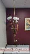 Awesome Tension Pole Floor Lamp with 3 - UFO Glass Shades and what appears to be original artificial flora. Examples found identifying manufacturer as both Majestic and LuxCraft.