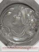 An Art Nouveau high relief portrait plate