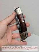 Cabela's Pocket Knife. KB