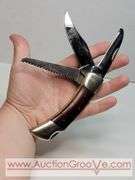 Cabela's Pocket Knife. KB