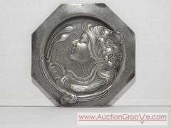 An Art Nouveau high relief portrait plate