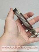 Cabela's Pocket Knife. KB