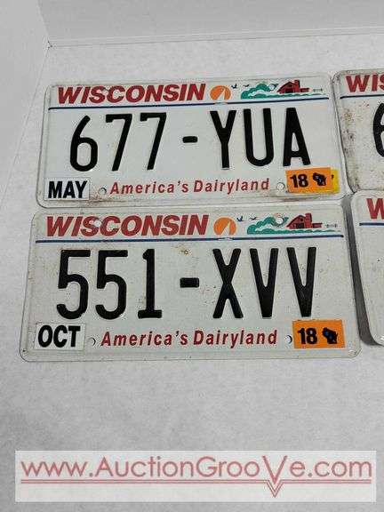 Four Wisconsin License Plates. A4