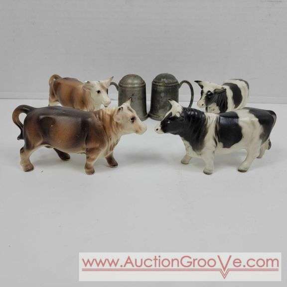 Victoria Ceramics Cow Salt and Pepper Shakers and Kirk Pewter. Both cow sets have one damaged horn each. See photos. A