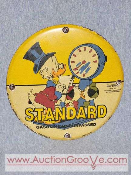 Standard Gasoline. Unsurpassed Walt Disney. Round Metal Sign. 12". B1