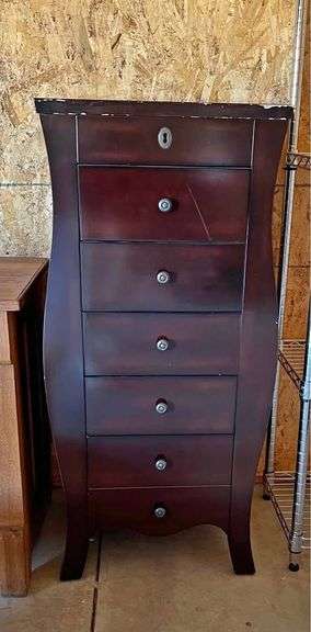 Jewelry Armoire from the Bombay Store Top opens with a 12”X 10” Mirror and cabinet has 5 single drawers, with a Double size bottom drawer.  40” H X 18” W X 14” L. See Photos. MA