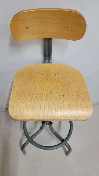 You are bidding on a Single, Swivel, Contoured Plywood, Adjustable Height Stools Chair by INTERION.  More available in this auction. Used and fully functional. See photos for details.  From Company in