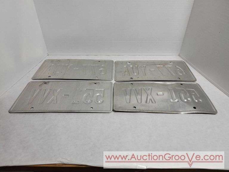 Four Wisconsin License Plates. A4