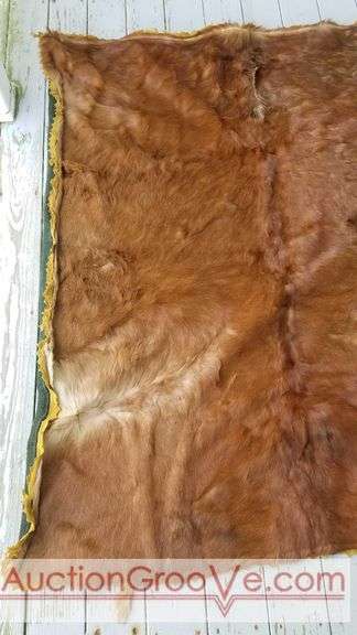 Antique horse sleigh lap blanket made from horse hide and wool. Manufactured by Mason City Furriers Kobe and Tanning Co. Lap blanket 66x55. Keep warm on the sleigh or use as home decor. Has a few "bal