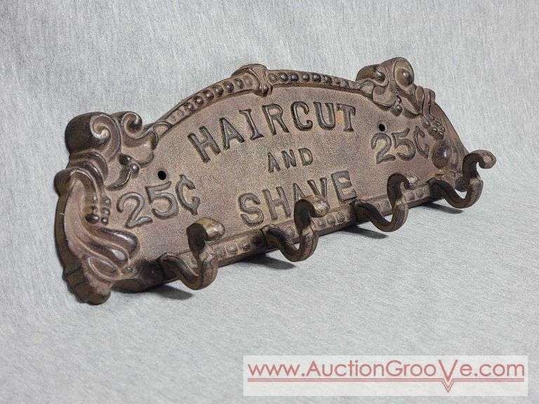Cast Iron Coat Hanger. Haircut and Shave 25 Cents. 13 x 5. A3