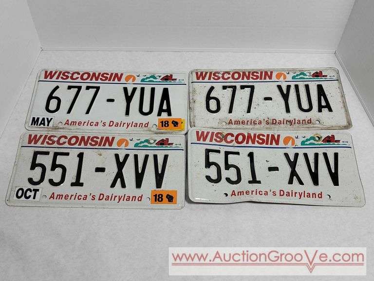 Four Wisconsin License Plates. A4