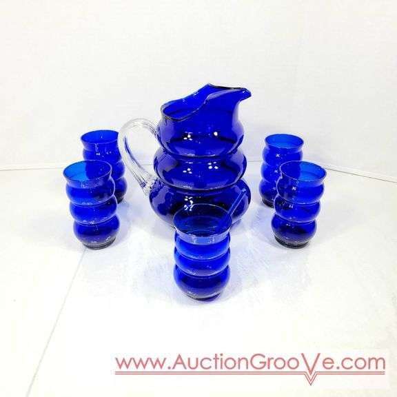 Vintage Louie Glass Co. Cobalt Blue Glass Harpo Pitcher and Tumbler 1930's. Wavy Cobalt Blue Pitcher and Five Glasses. 8 x 9.