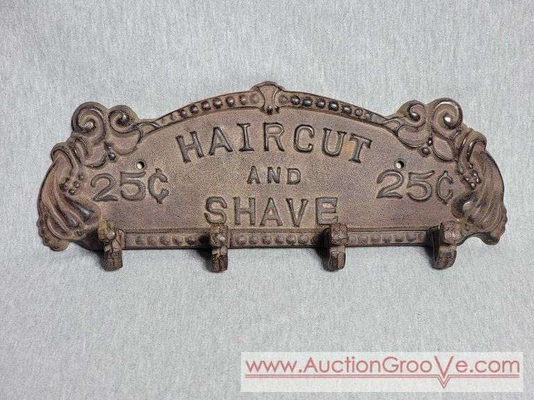 Cast Iron Coat Hanger. Haircut and Shave 25 Cents. 13 x 5. A3