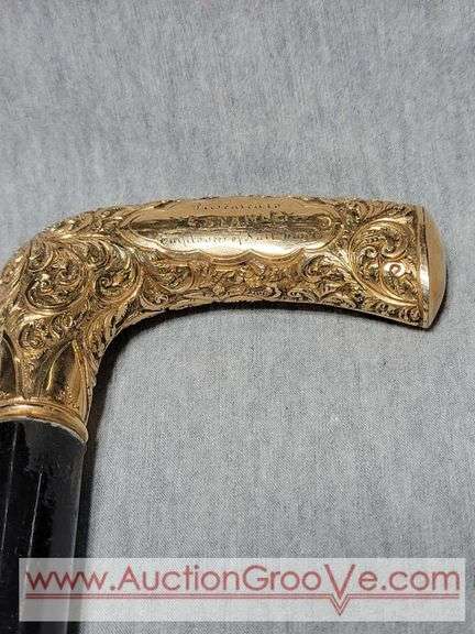 Golden Handle Cane inscribed, "Presented to E. Stanley Employee of National Bag Co. 33". A2