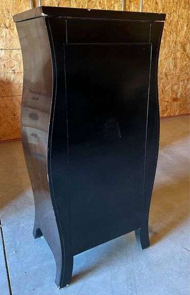 Jewelry Armoire from the Bombay Store Top opens with a 12”X 10” Mirror and cabinet has 5 single drawers, with a Double size bottom drawer.  40” H X 18” W X 14” L. See Photos. MA