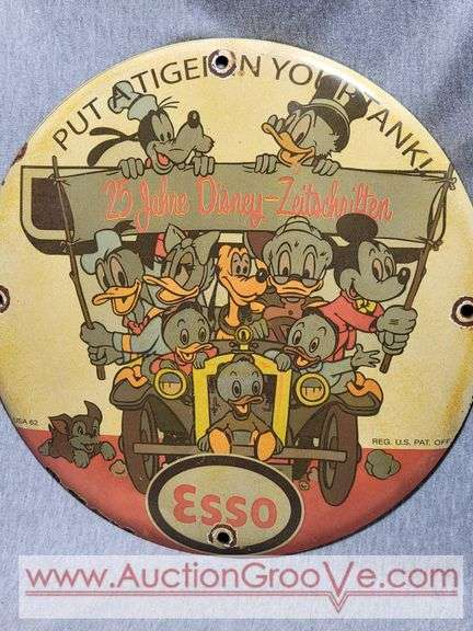 Esso "Put a Tiger in Your Tank" 25 Year Disney Anniversary Round Porcelain Enamel Advertising Sign. 12" diameter. A2