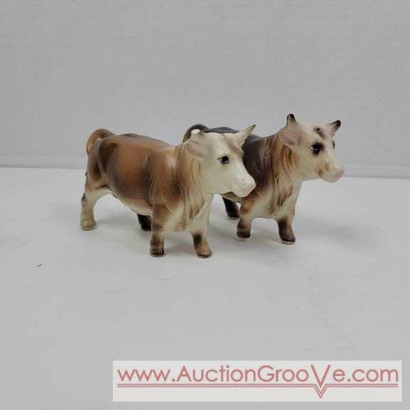 Victoria Ceramics Cow Salt and Pepper Shakers and Kirk Pewter. Both cow sets have one damaged horn each. See photos. A