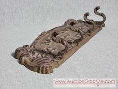 Cast Iron Coat Hanger. Haircut and Shave 25 Cents. 13 x 5. A3