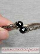 SARDA Sterling Silver Black Onyx Hinged Bangle Bracelet. Onyx has a few chips. 13.4g. JB