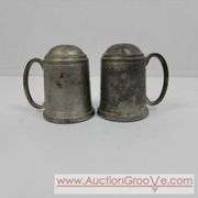 Victoria Ceramics Cow Salt and Pepper Shakers and Kirk Pewter. Both cow sets have one damaged horn each. See photos. A