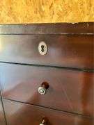 Jewelry Armoire from the Bombay Store Top opens with a 12”X 10” Mirror and cabinet has 5 single drawers, with a Double size bottom drawer.  40” H X 18” W X 14” L. See Photos. MA