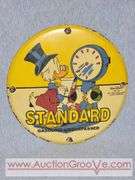 Standard Gasoline. Unsurpassed Walt Disney. Round Metal Sign. 12". B1