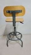 You are bidding on a Single, Swivel, Contoured Plywood, Adjustable Height Stools Chair by INTERION. 

More available in this auction.

Used and fully functional. See photos for details. 

From Company