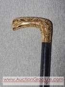 Golden Handle Cane inscribed, "Presented to E. Stanley Employee of National Bag Co. 33". A2
