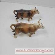 Victoria Ceramics Cow Salt and Pepper Shakers and Kirk Pewter. Both cow sets have one damaged horn each. See photos. A
