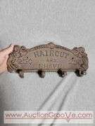 Cast Iron Coat Hanger. Haircut and Shave 25 Cents. 13 x 5. A3